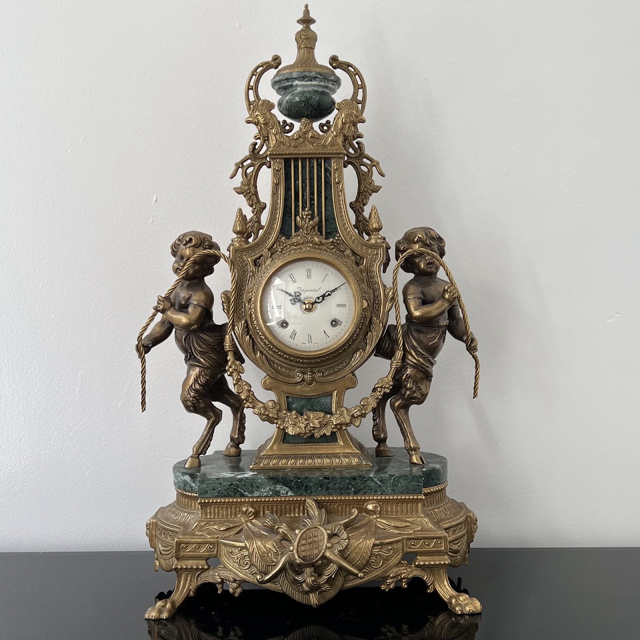 Brevettato Italian Antique Brass and Green Marble Figural Mantel Clock and Candelabra Pair