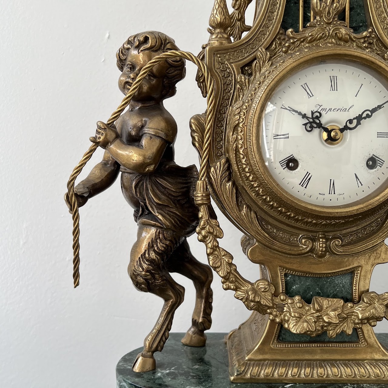 Brevettato Italian Antique Brass and Green Marble Figural Mantel Clock and Candelabra Pair