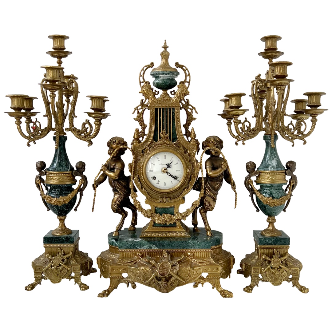 Brevettato Italian Antique Brass and Green Marble Figural Mantel Clock and Candelabra Pair