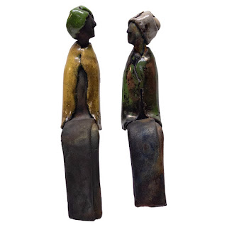 Signed Ceramic Pair of Table Edge Sitting Figurines