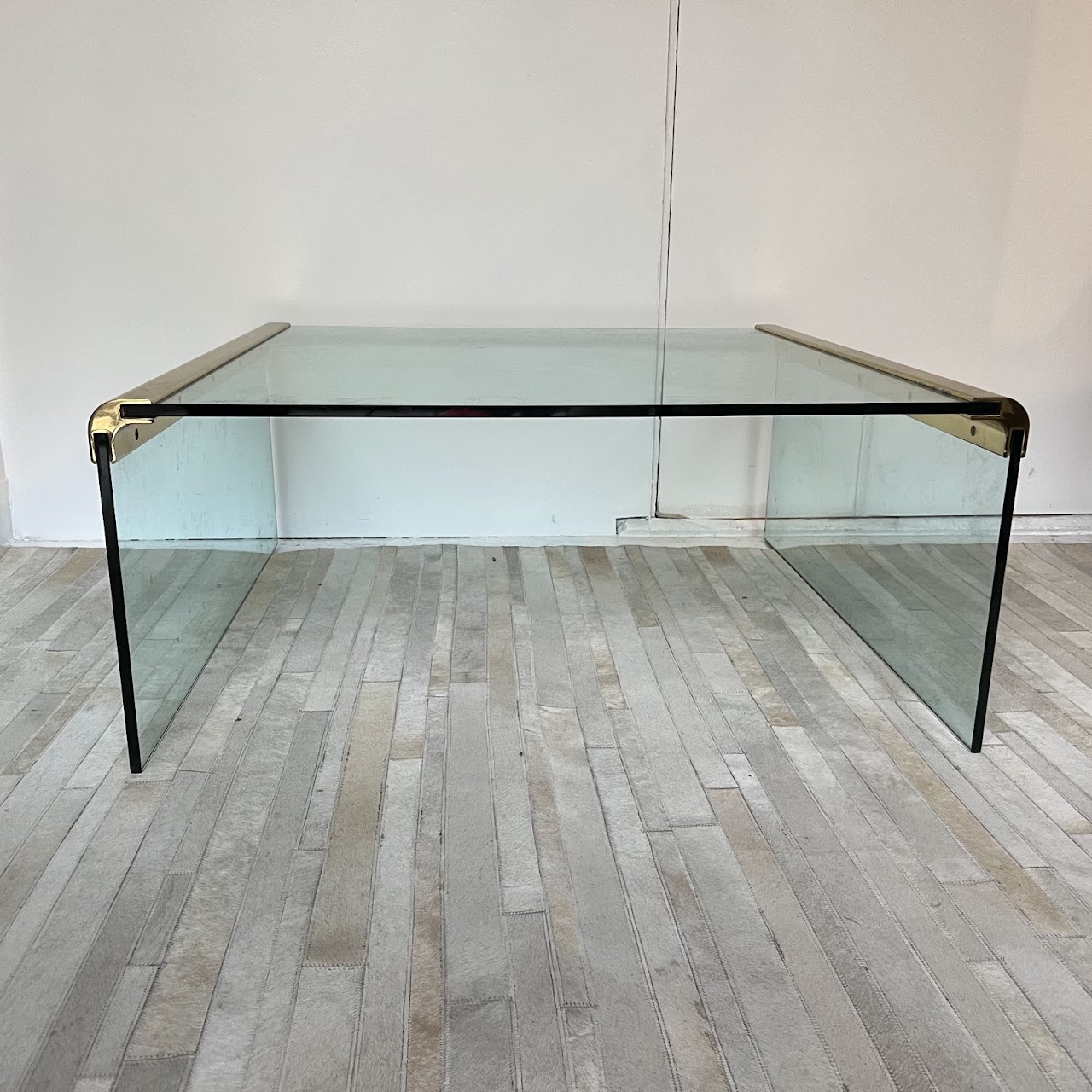 Leon Rosen for Pace Collection Style 1970s Glass and Brass Waterfall Cocktail Table