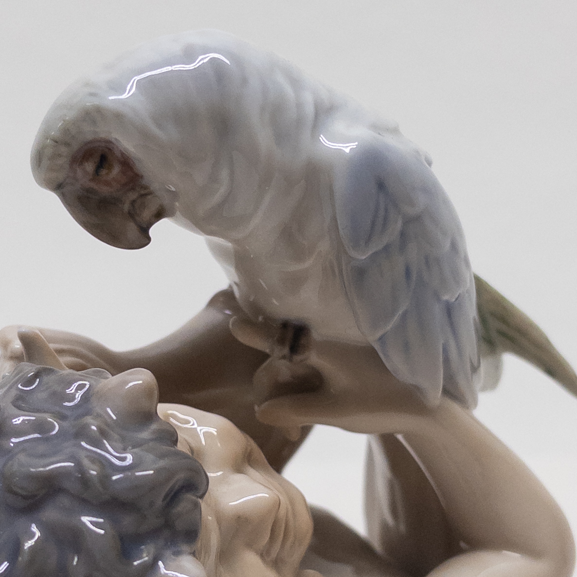 Royal Copenhagen Faun Holding a  Parrot Figurine