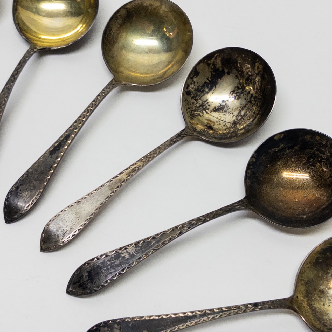 Twelve Sterling Silver Merklein Spoons