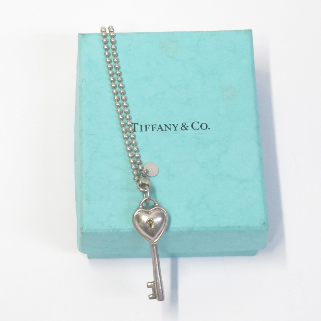 Tiffany & Co. Sterling Silver and 18K Gold Key Pendant Necklace