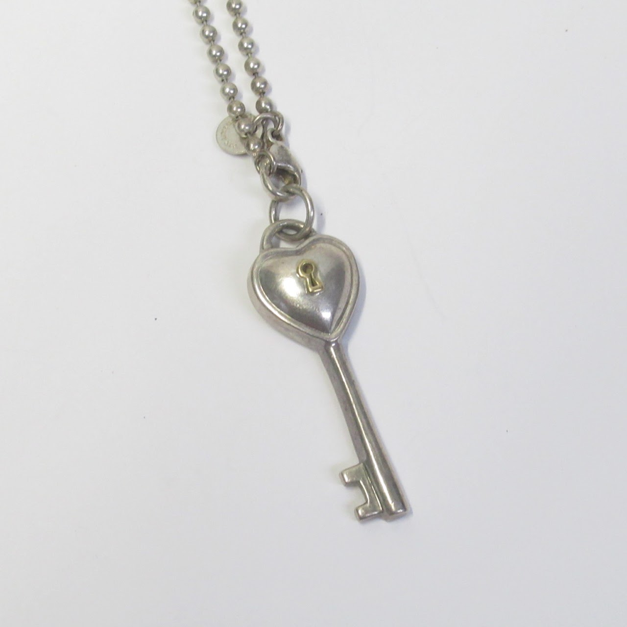 Tiffany & Co. Sterling Silver and 18K Gold Key Pendant Necklace