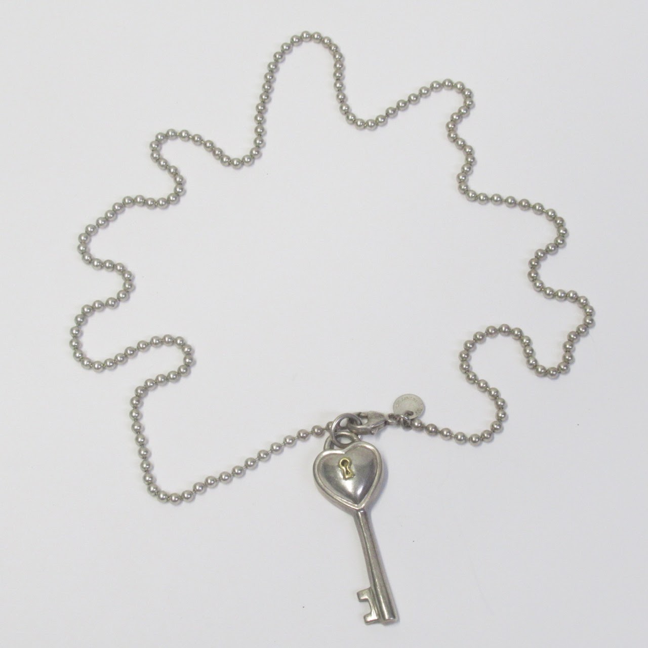 Tiffany & Co. Sterling Silver and 18K Gold Key Pendant Necklace