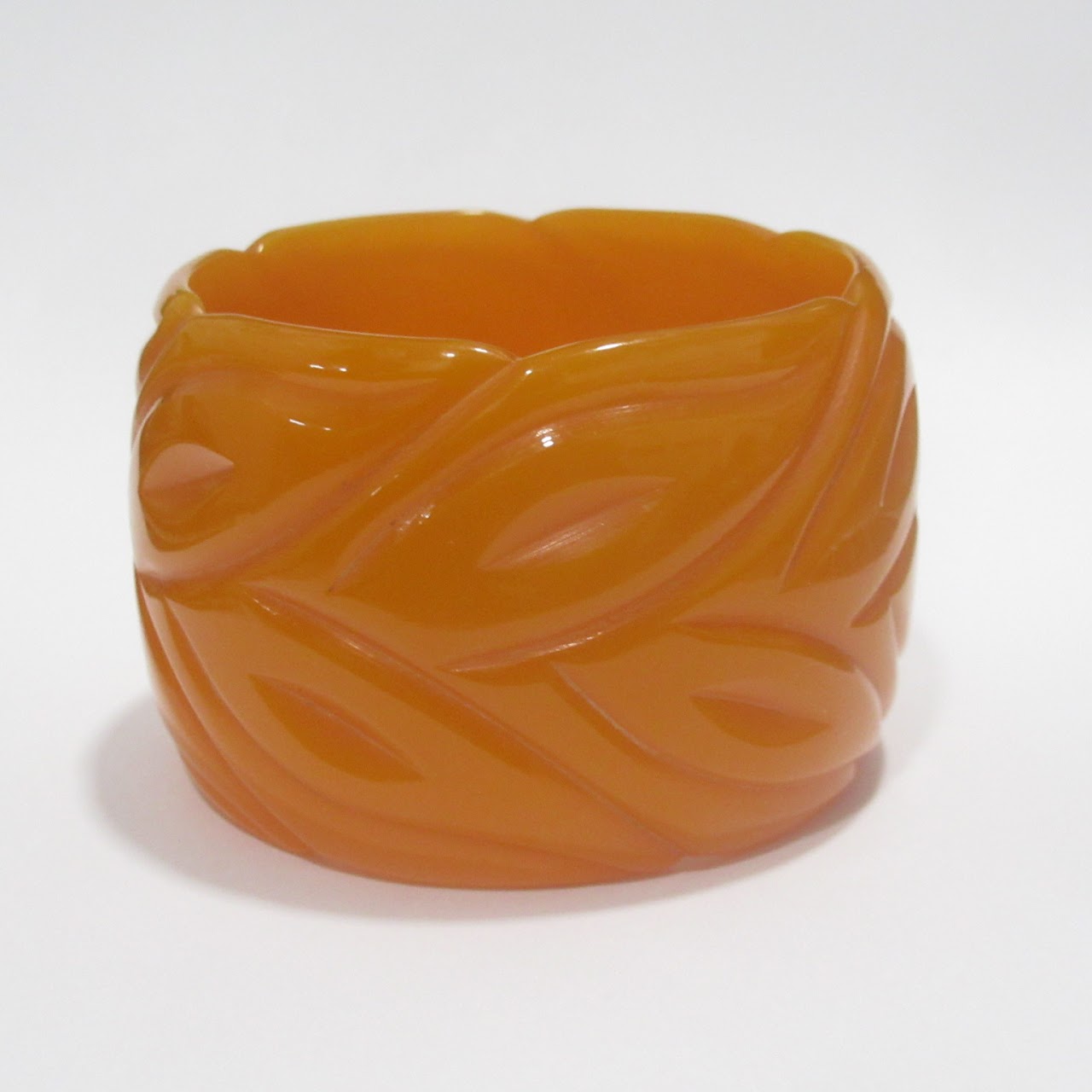 Orange Bakelite Carved Bangle