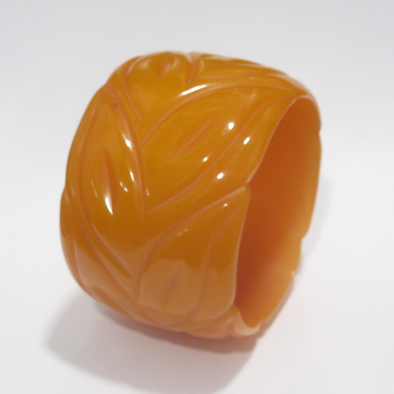 Orange Bakelite Carved Bangle