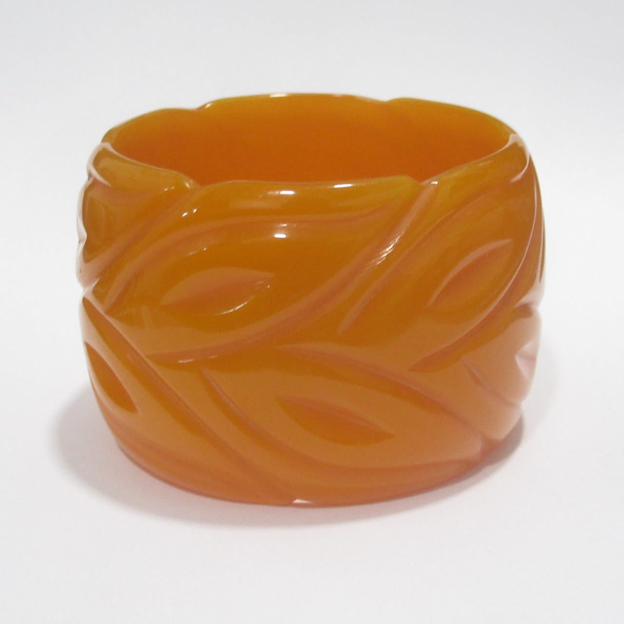 Orange Bakelite Carved Bangle