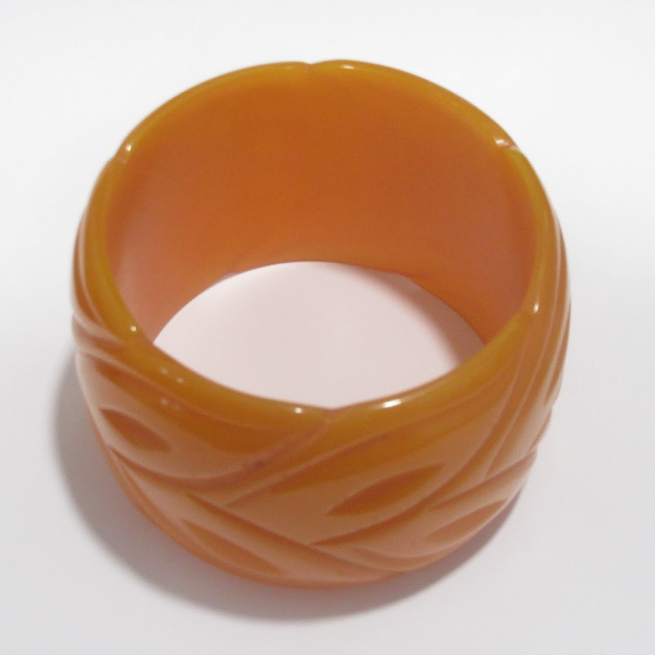 Orange Bakelite Carved Bangle