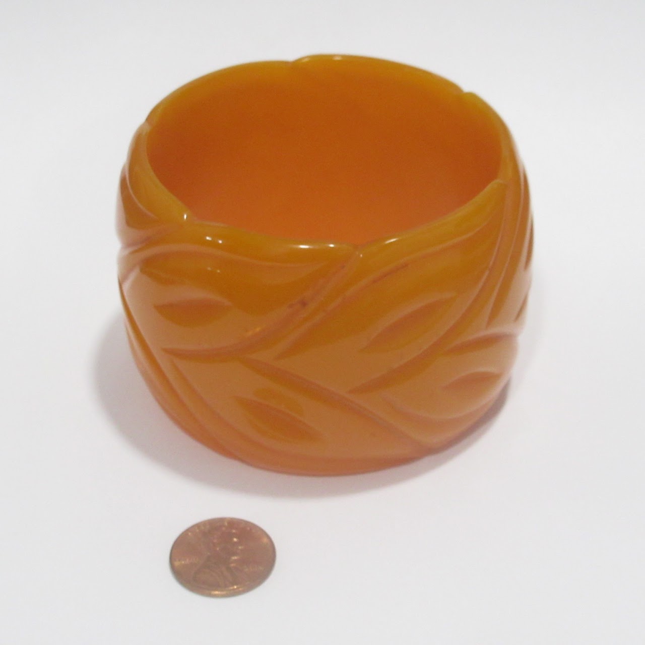 Orange Bakelite Carved Bangle