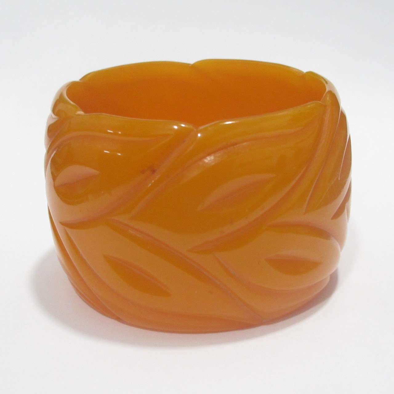 Orange Bakelite Carved Bangle