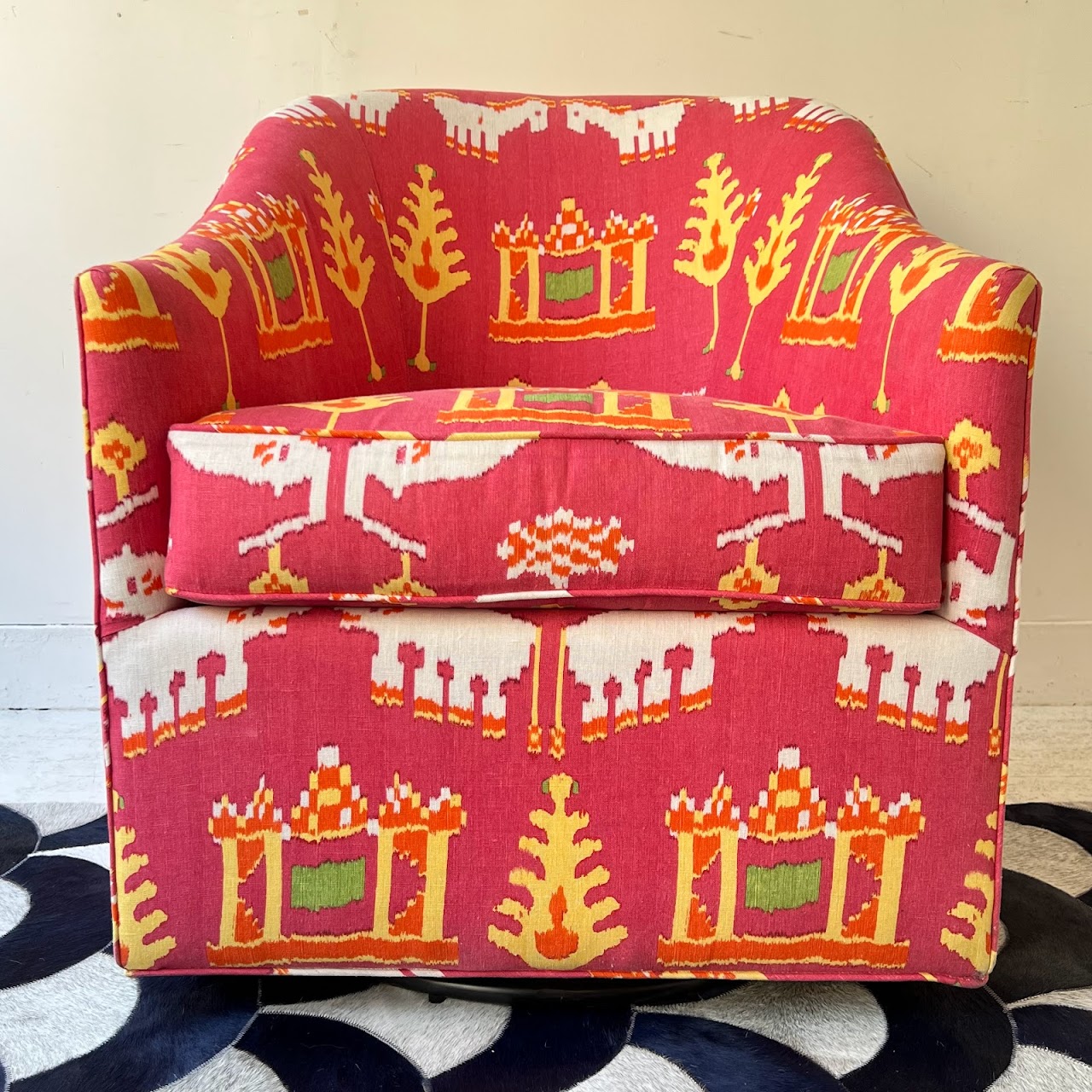 Ikat Upholstered Swivel Shelter-Back Chair