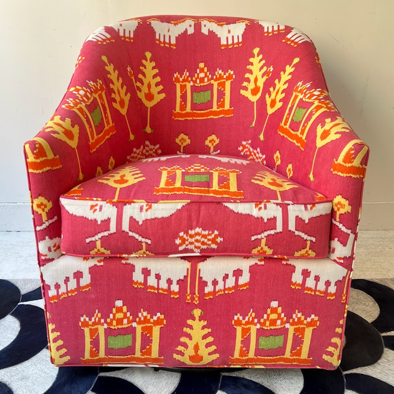 Ikat Upholstered Swivel Shelter-Back Chair