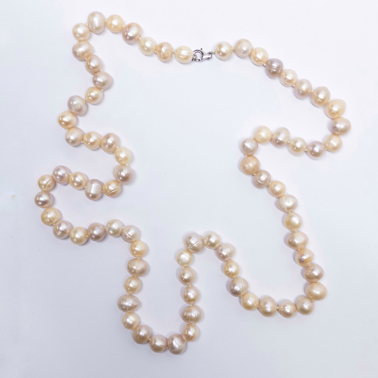 Sterling Silver and Ringed Baroque Freshwater Champagne Pearl Necklace