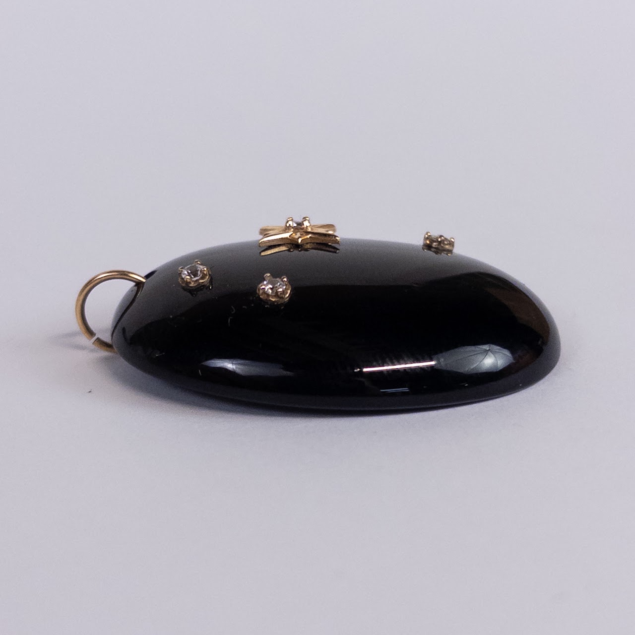 Onyx, Diamond and 14K Gold Stellate Cabochon Pendant