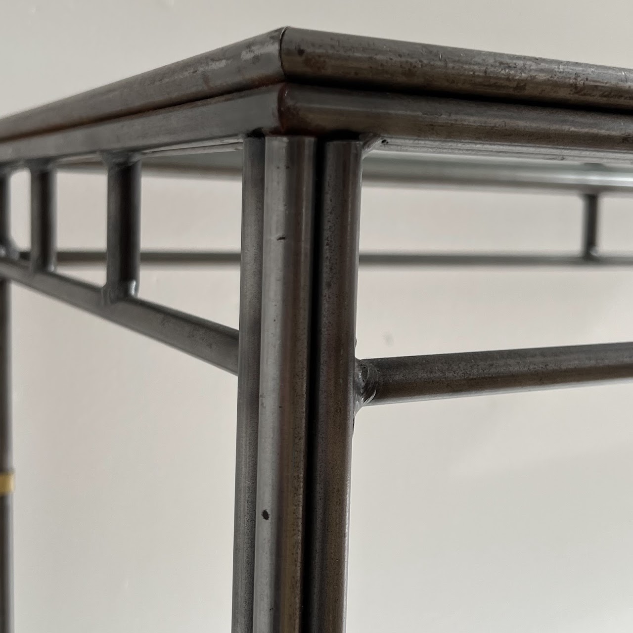 Brass Bound Steel and Plate Glass Console Table