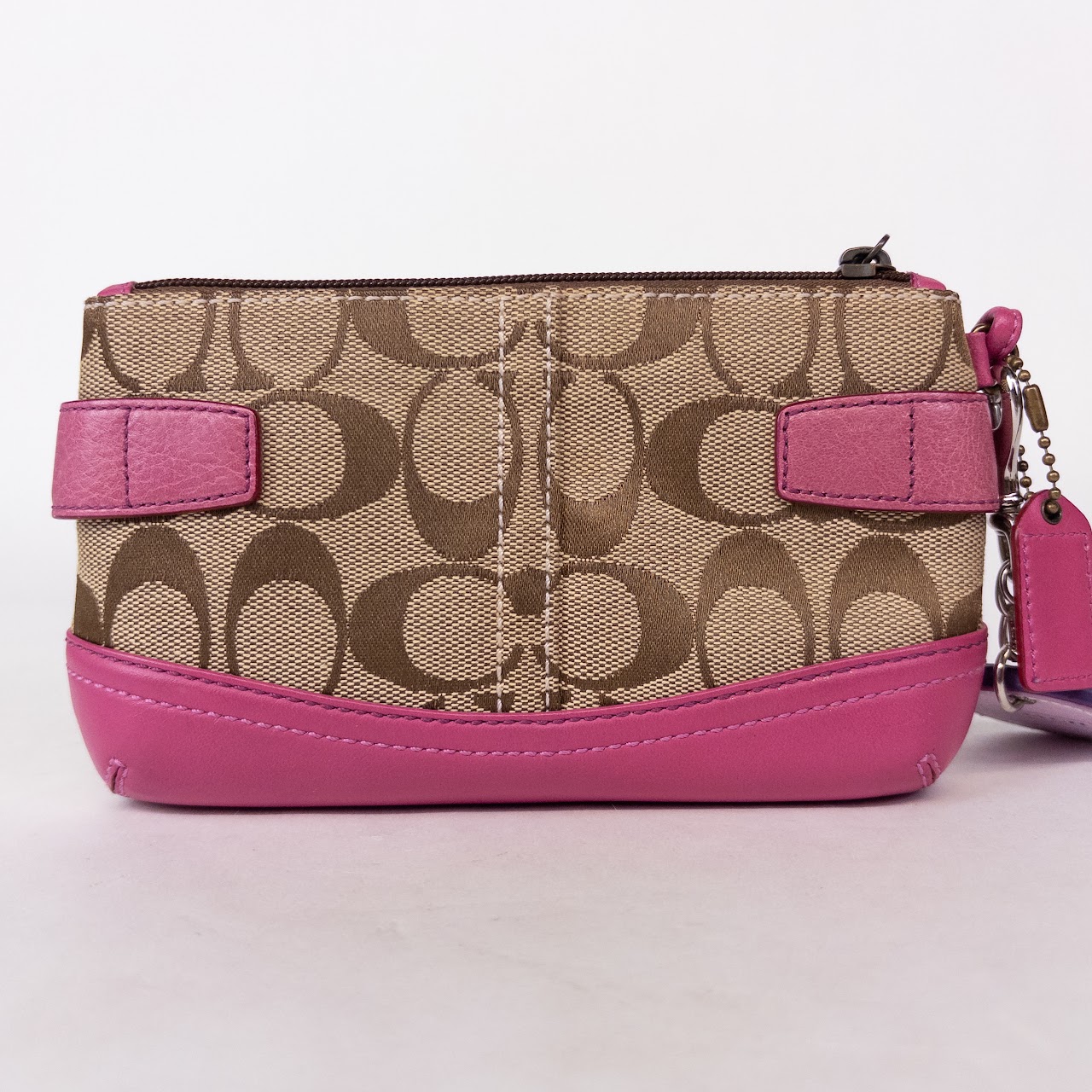 Coach Signature Monogram Wristlet with Capricorn Coach Charm