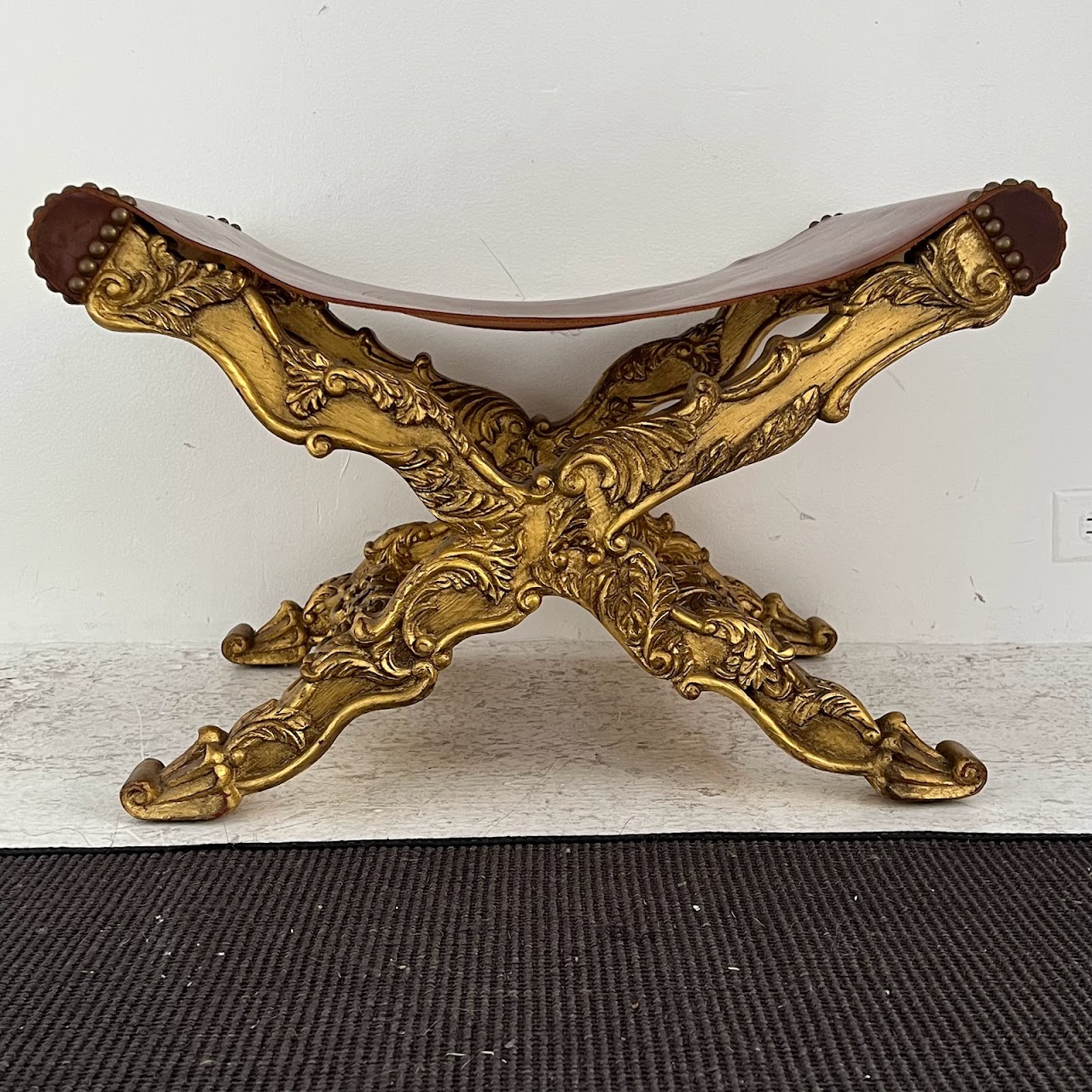 Italianate Carved Giltwood and Leather Curule Stool