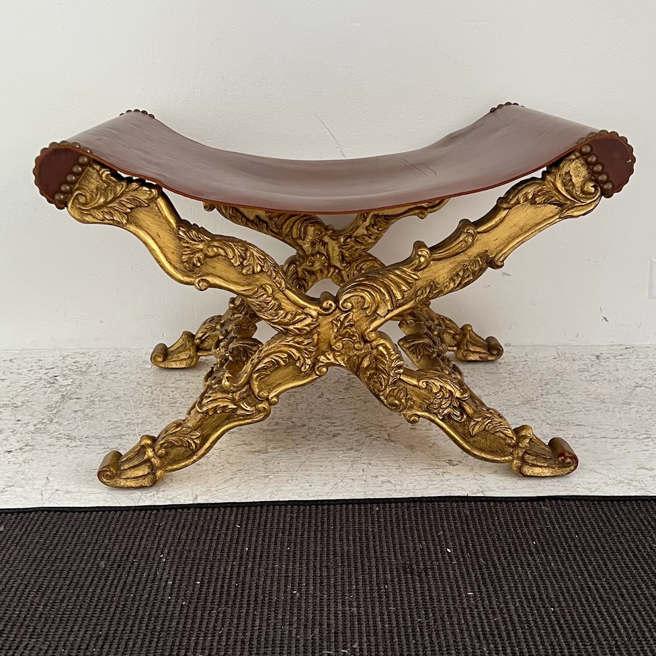 Italianate Carved Giltwood and Leather Curule Stool