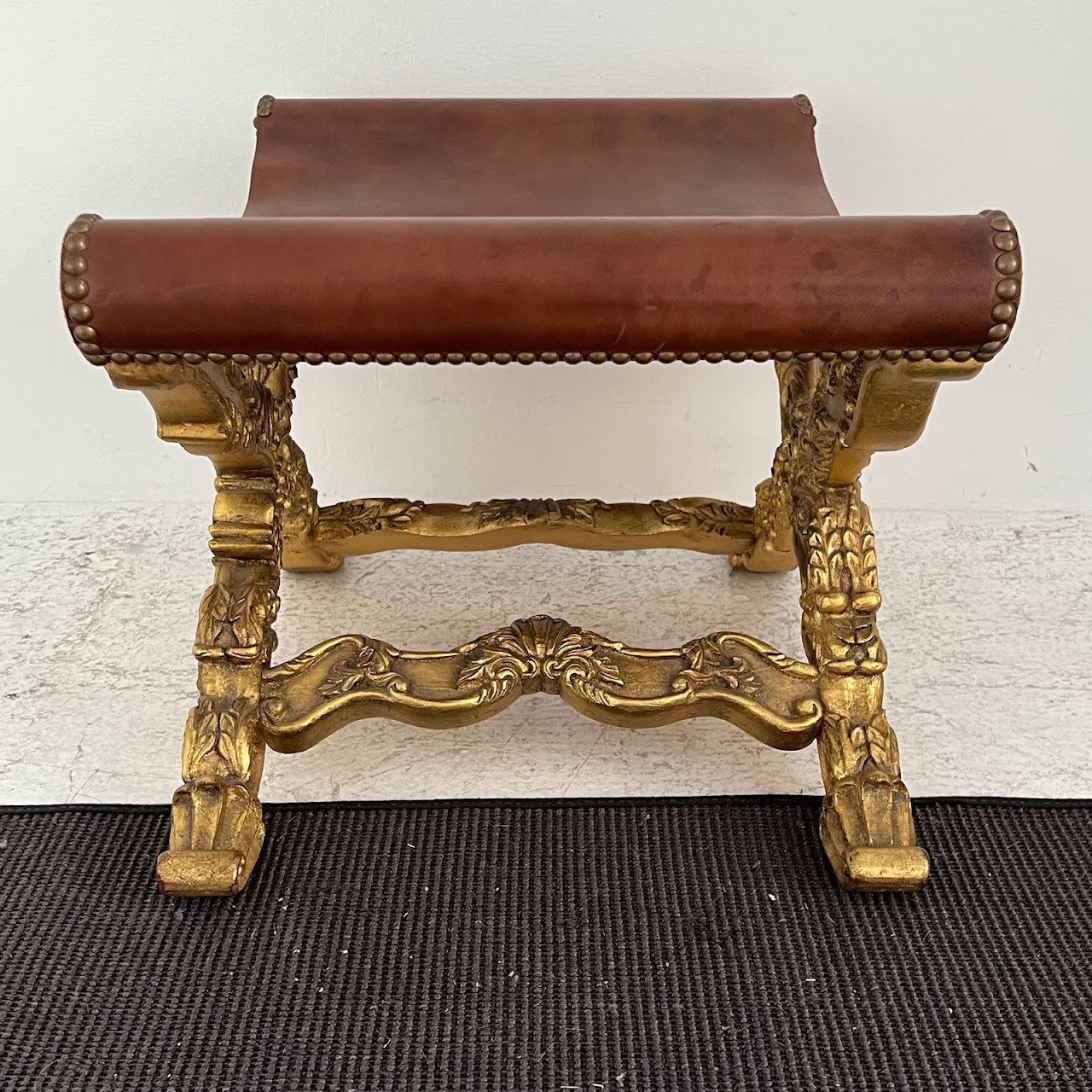 Italianate Carved Giltwood and Leather Curule Stool