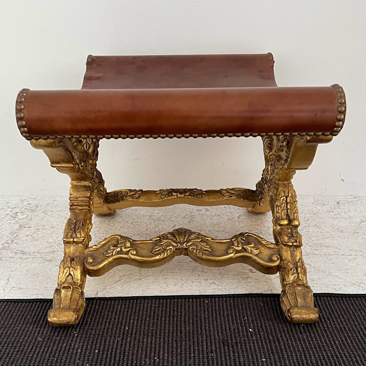 Italianate Carved Giltwood and Leather Curule Stool