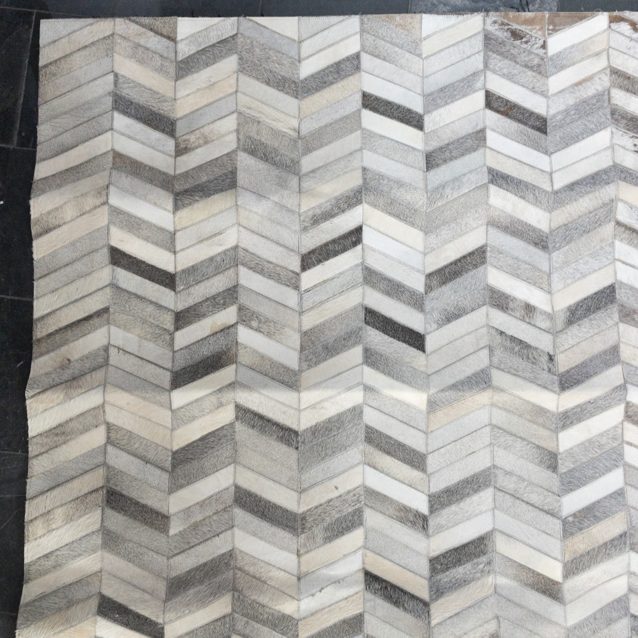 Cowhide Herringbone Patchwork Area Rug