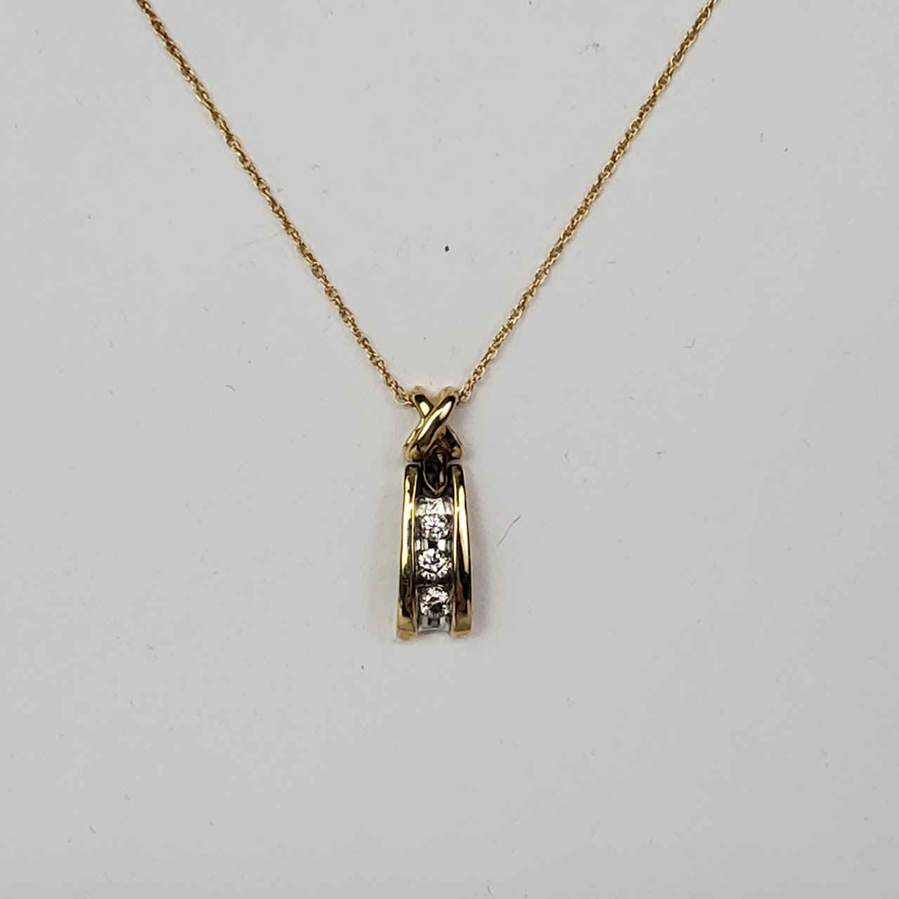 10K Gold 'X' Diamond Pendant