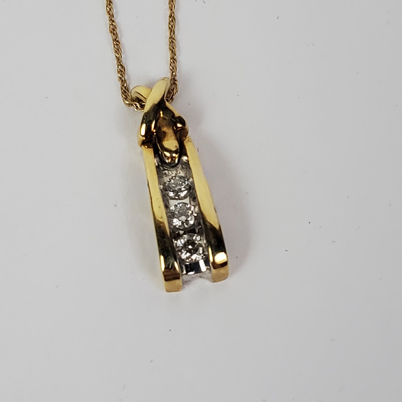 10K Gold 'X' Diamond Pendant