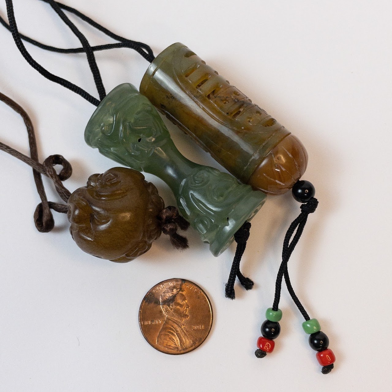 Carved Jade Pendant Trio