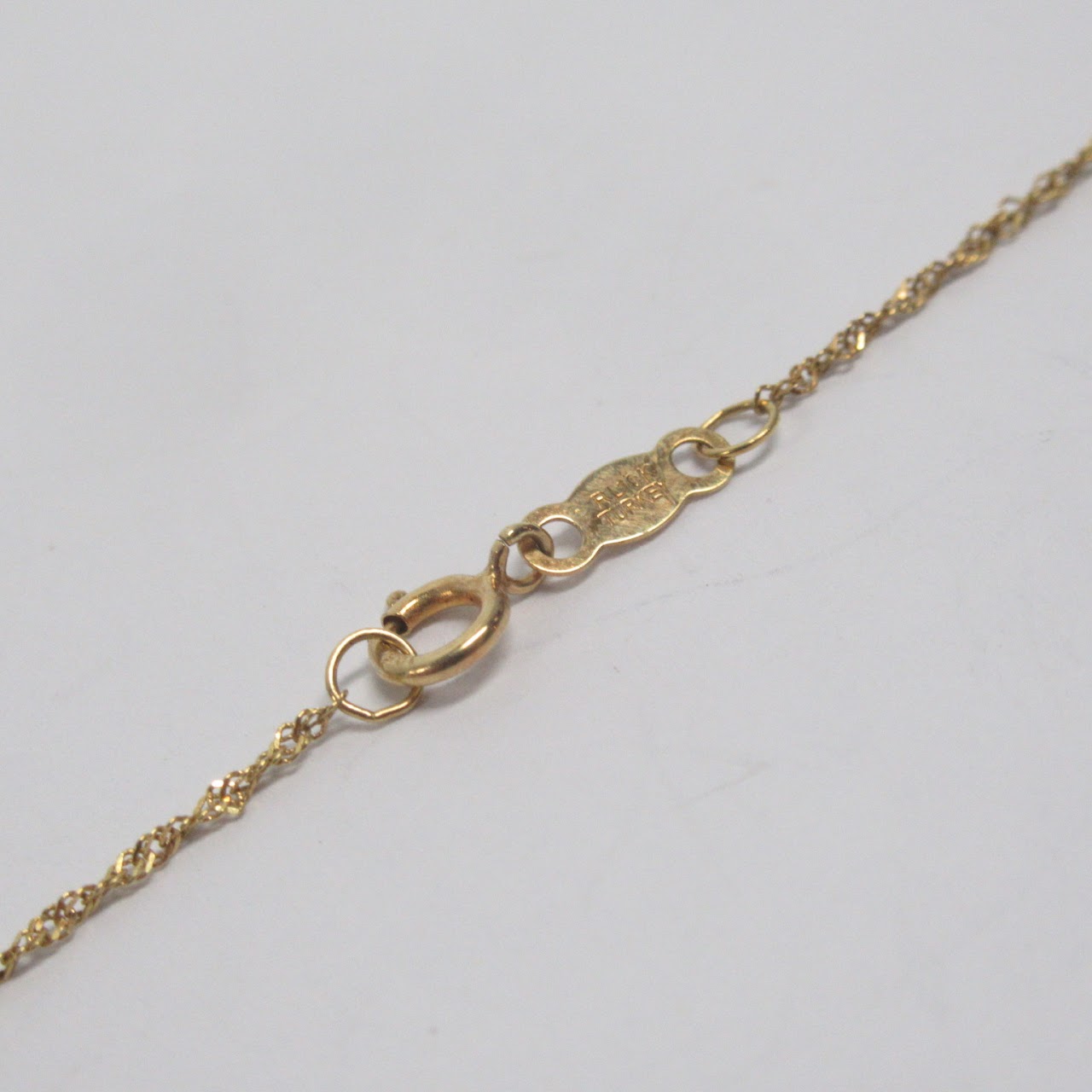 10K Gold Triple Heart Pendant Necklace