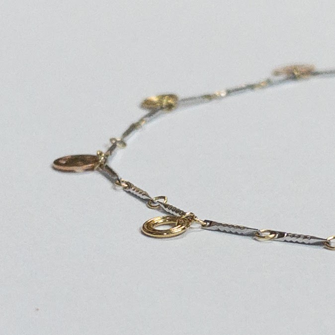 18K White and Yellow Gold Charm Bracelet