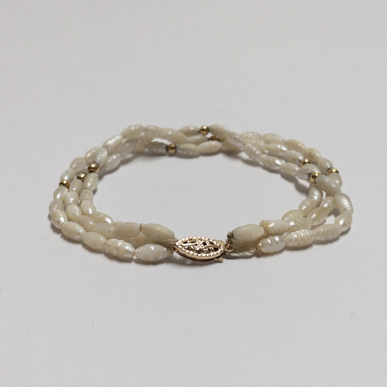 14K Gold Rice Pearl Triple Strand Bracelet  NEEDS REPAIR