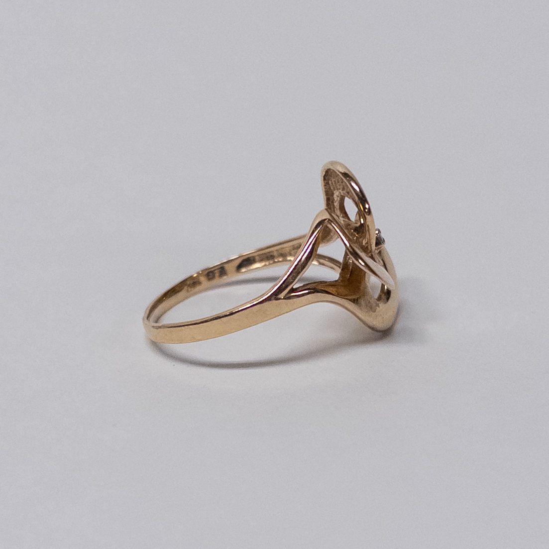 14K Gold Interlocking Circles Ring with Tiny Diamond Center