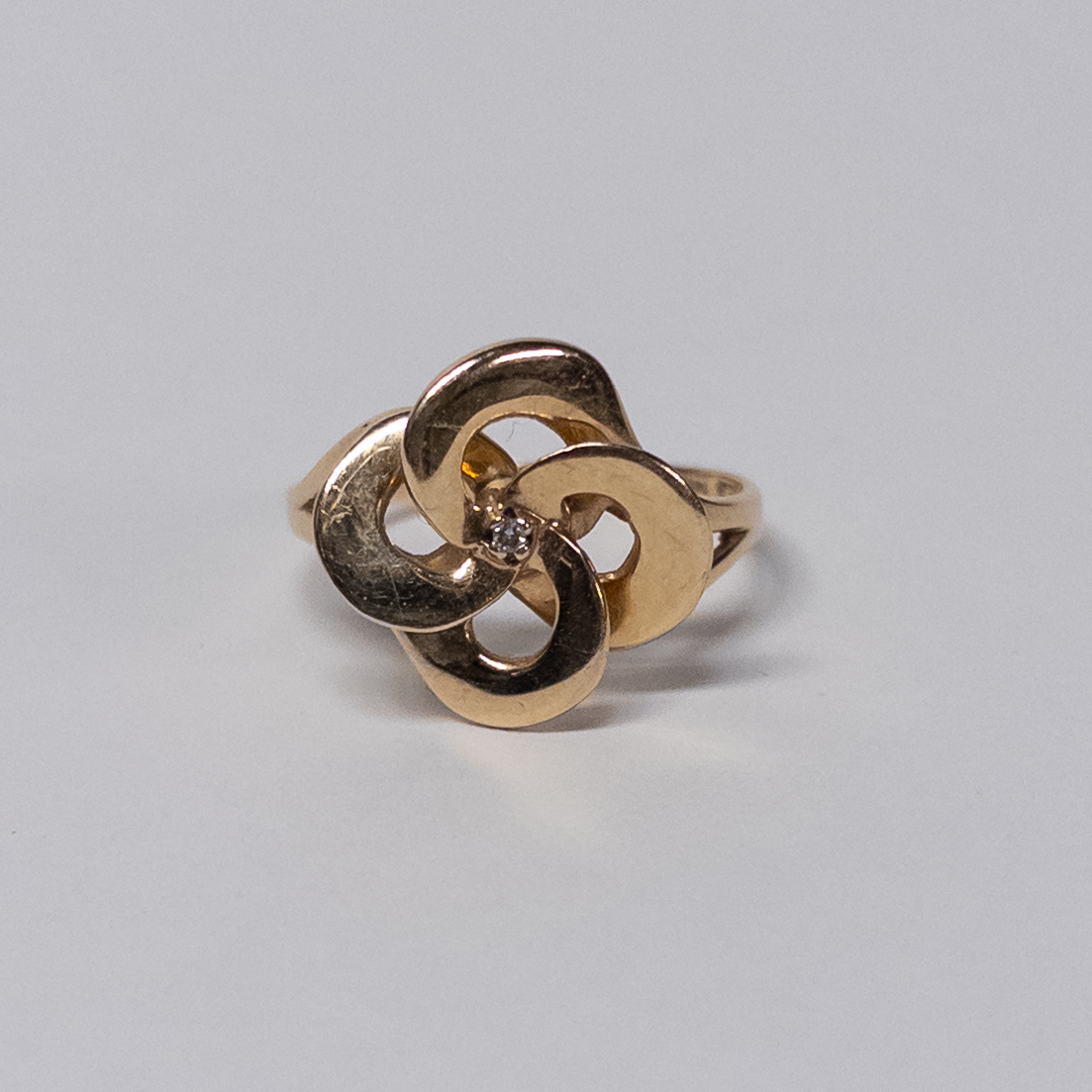 14K Gold Interlocking Circles Ring with Tiny Diamond Center