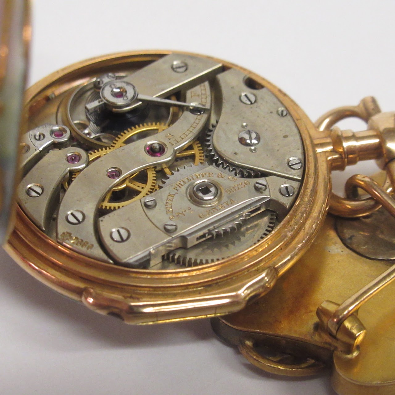 Patek Philippe 18K Gold, Diamond, Ruby, and Enamel Lapel Watch