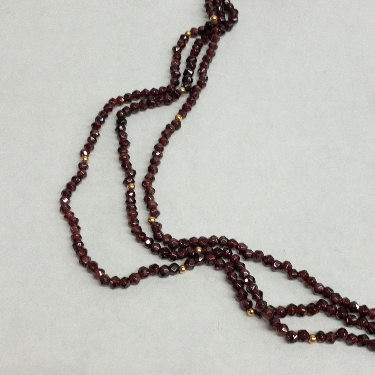 Garnet and 14K Gold Triple Strand Necklace