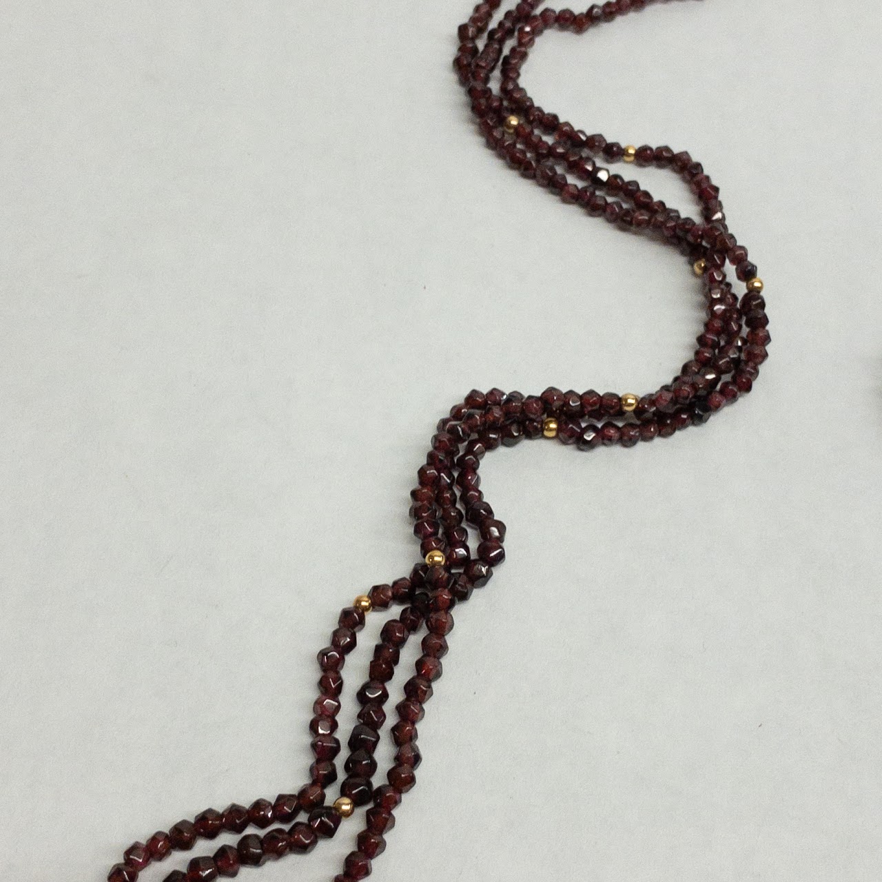 Garnet and 14K Gold Triple Strand Necklace