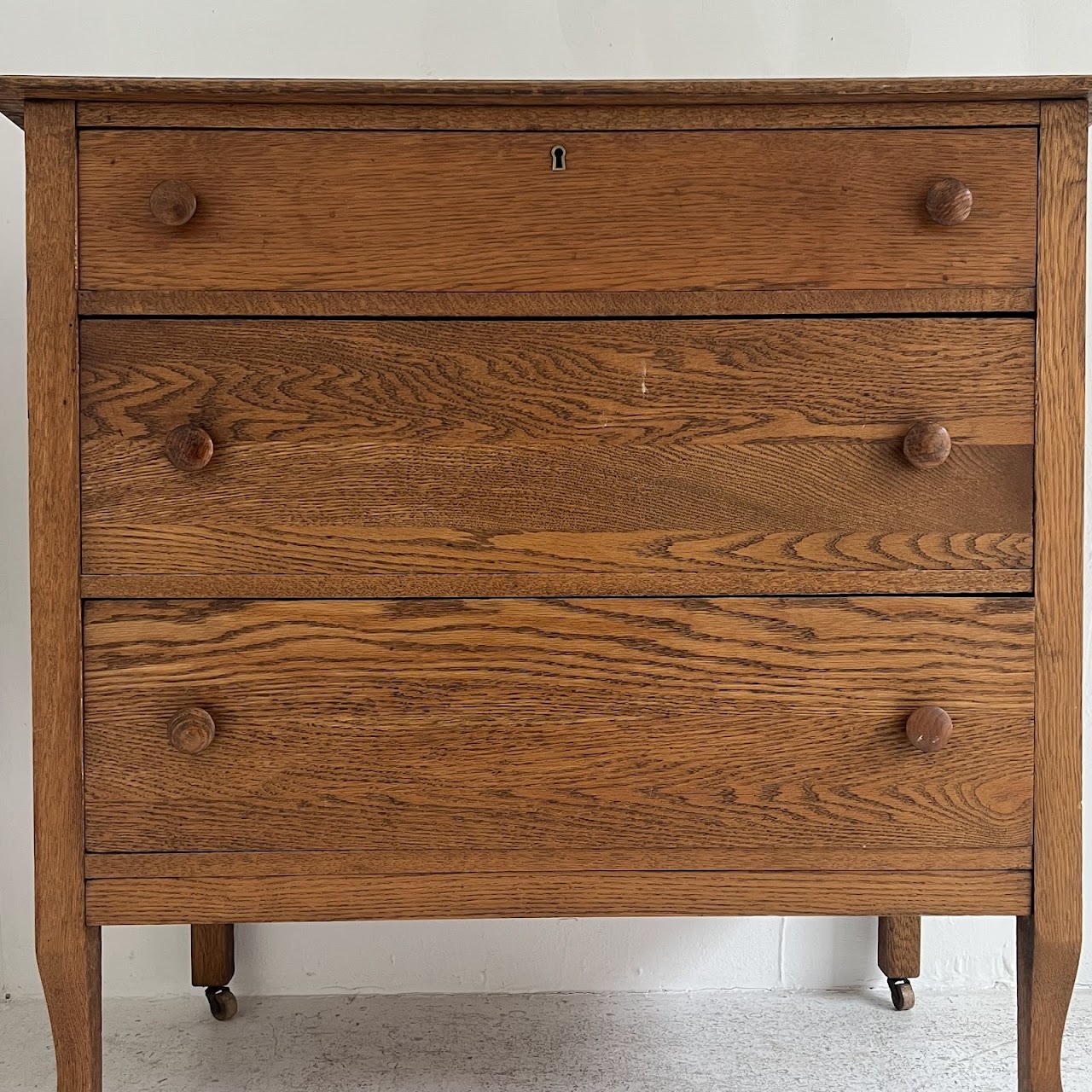 Oak Antique Three-Drawer Dresser with Casters