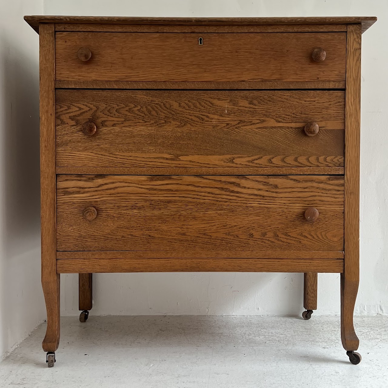 Oak Antique Three-Drawer Dresser with Casters