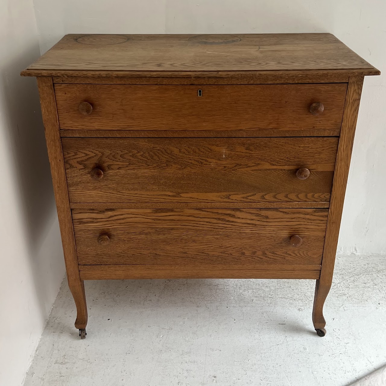 Oak Antique Three-Drawer Dresser with Casters