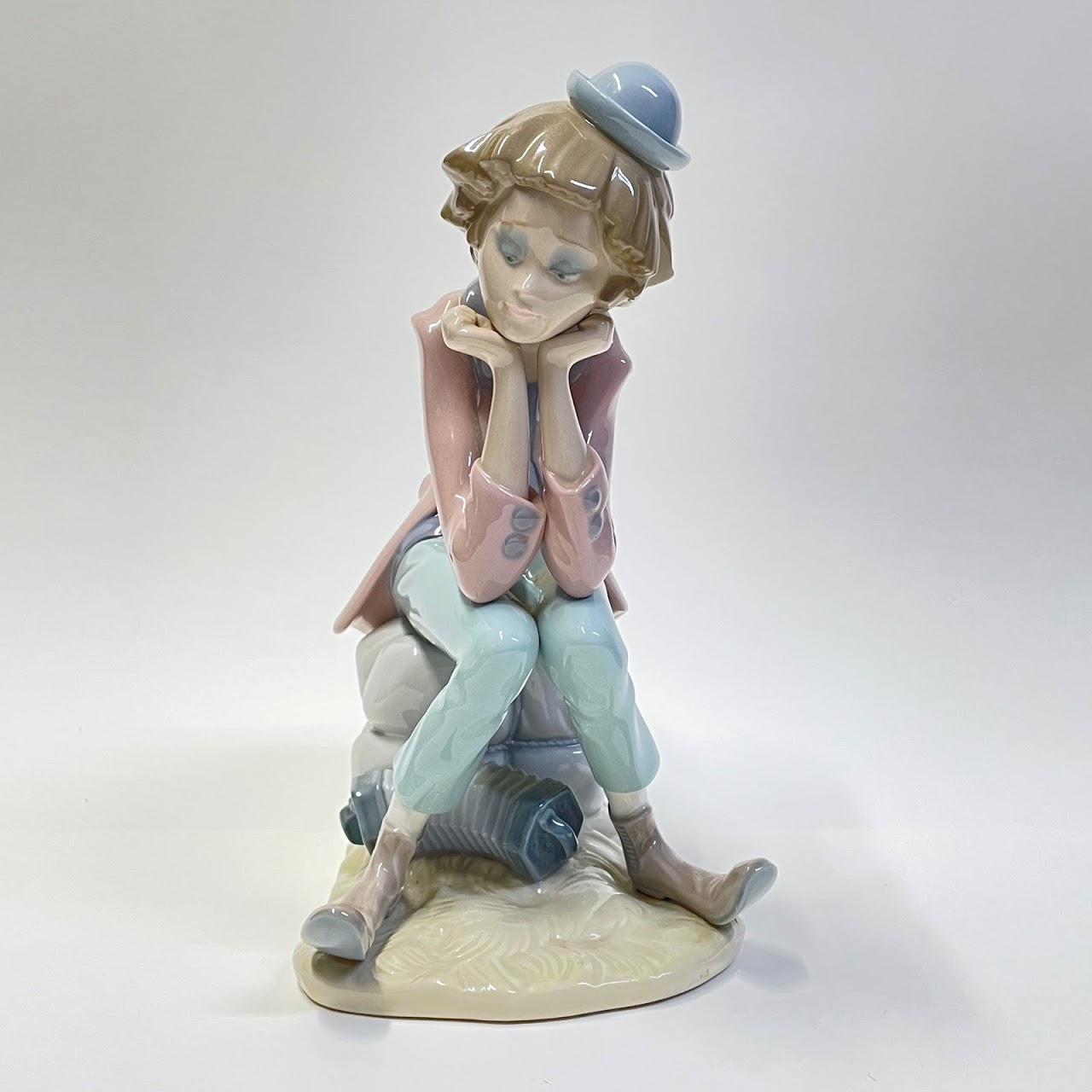 Lladró Pensive Sitting Clown with Accordion Figurine