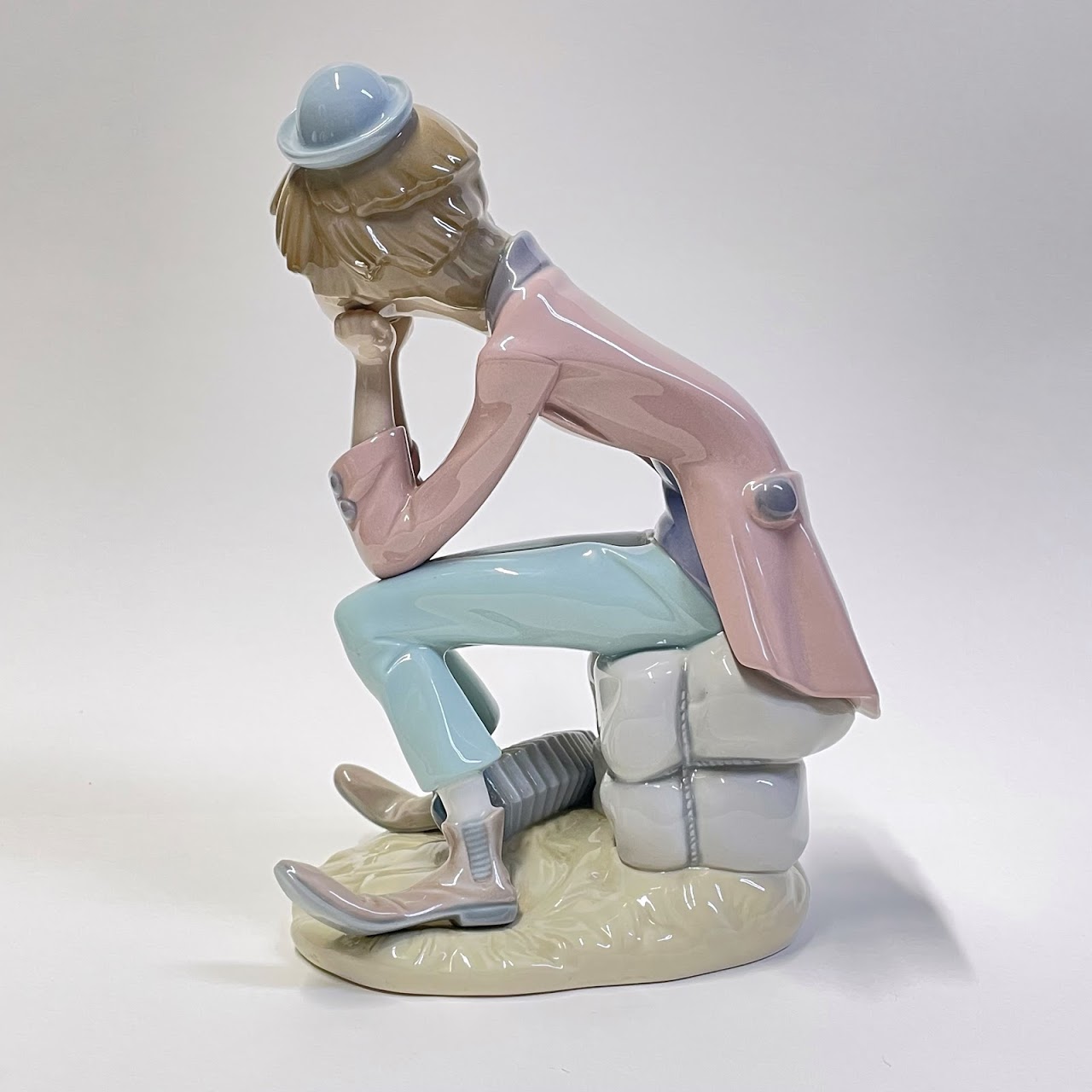 Lladró Pensive Sitting Clown with Accordion Figurine