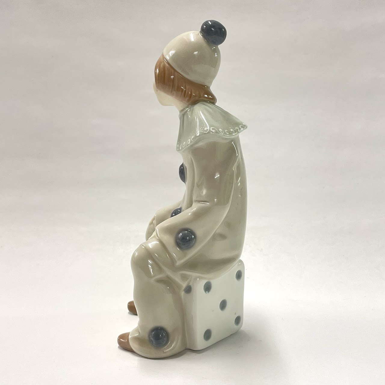 Lladró Sitting Clown on Dice  Figurine